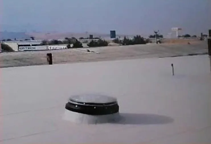 After: the same roof vent with no visible steam