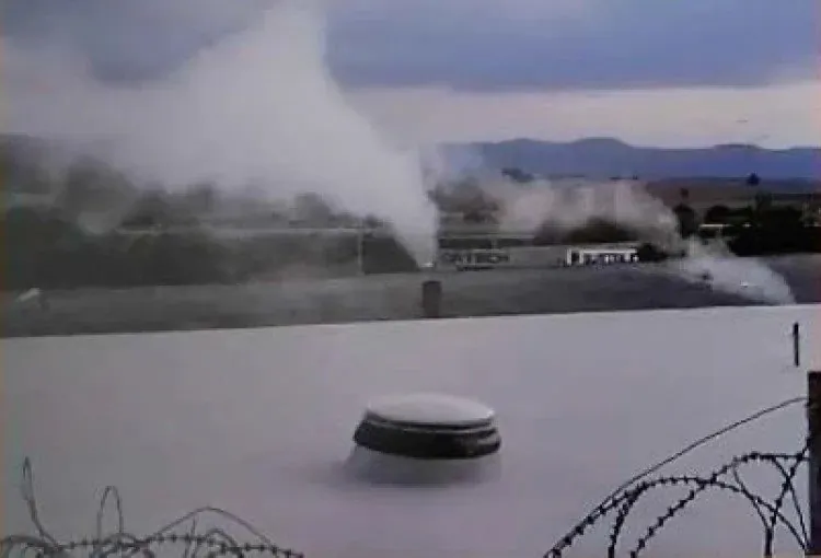 Before: steam venting from the plant roof