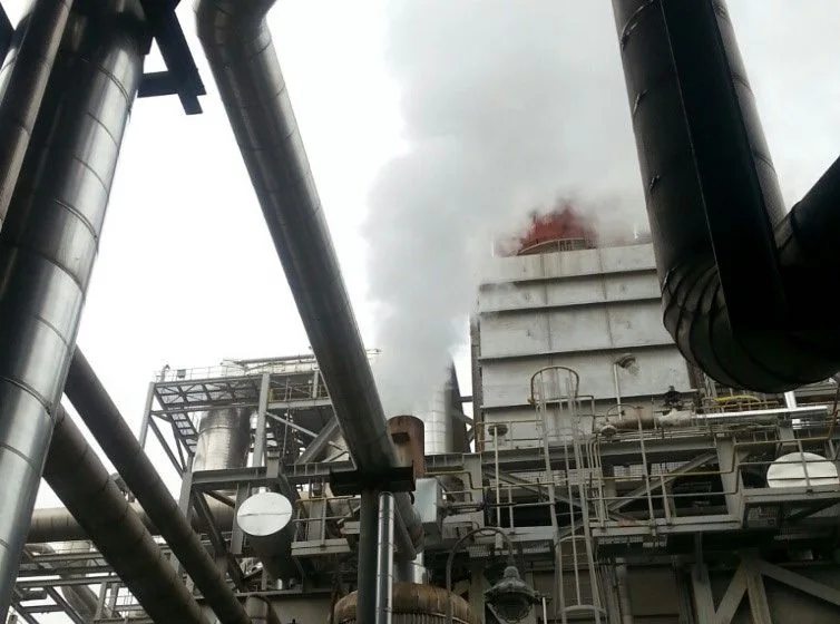 Before: flash steam venting above the condensate drum